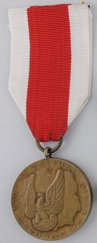 Medal of Merit for National Defence, III Class Obverse