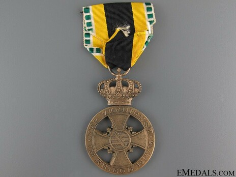 War Merit Decoration, I Class Medal (in bronze) Reverse
