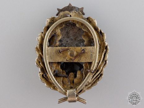 Interwar RVT Regimental Badge (by W.F. Muller) Reverse