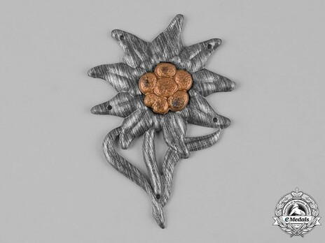 German Army Edelweiss Cap Insignia (with stem) Obverse