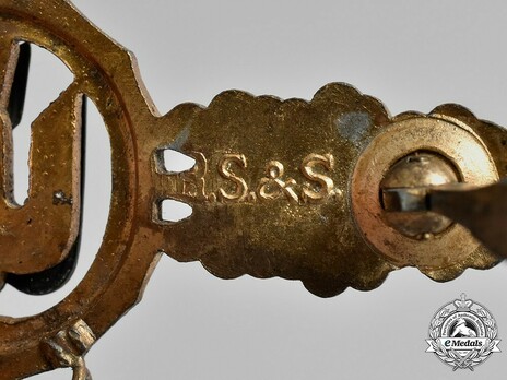 Bomber Clasp, in Gold (with "200" pendant) Detail