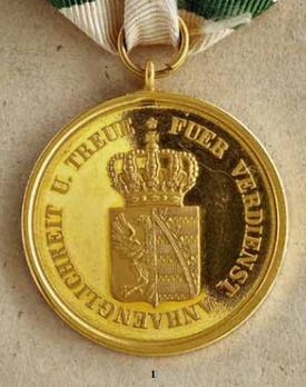 Medal for Merit, Loyalty, and Allegiance in Gold Reverse