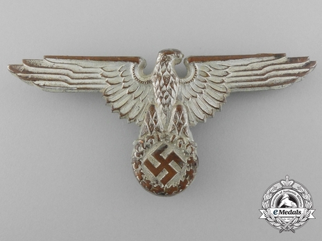 Waffen-SS Metal Cap Eagle Type II, by Assmann (cupal) Obverse