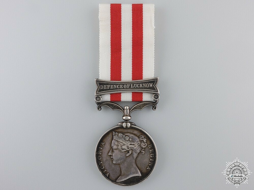 Silver medal with defence of lucknow clasp stamped w. wyon r.a. l.c. wyon obverse